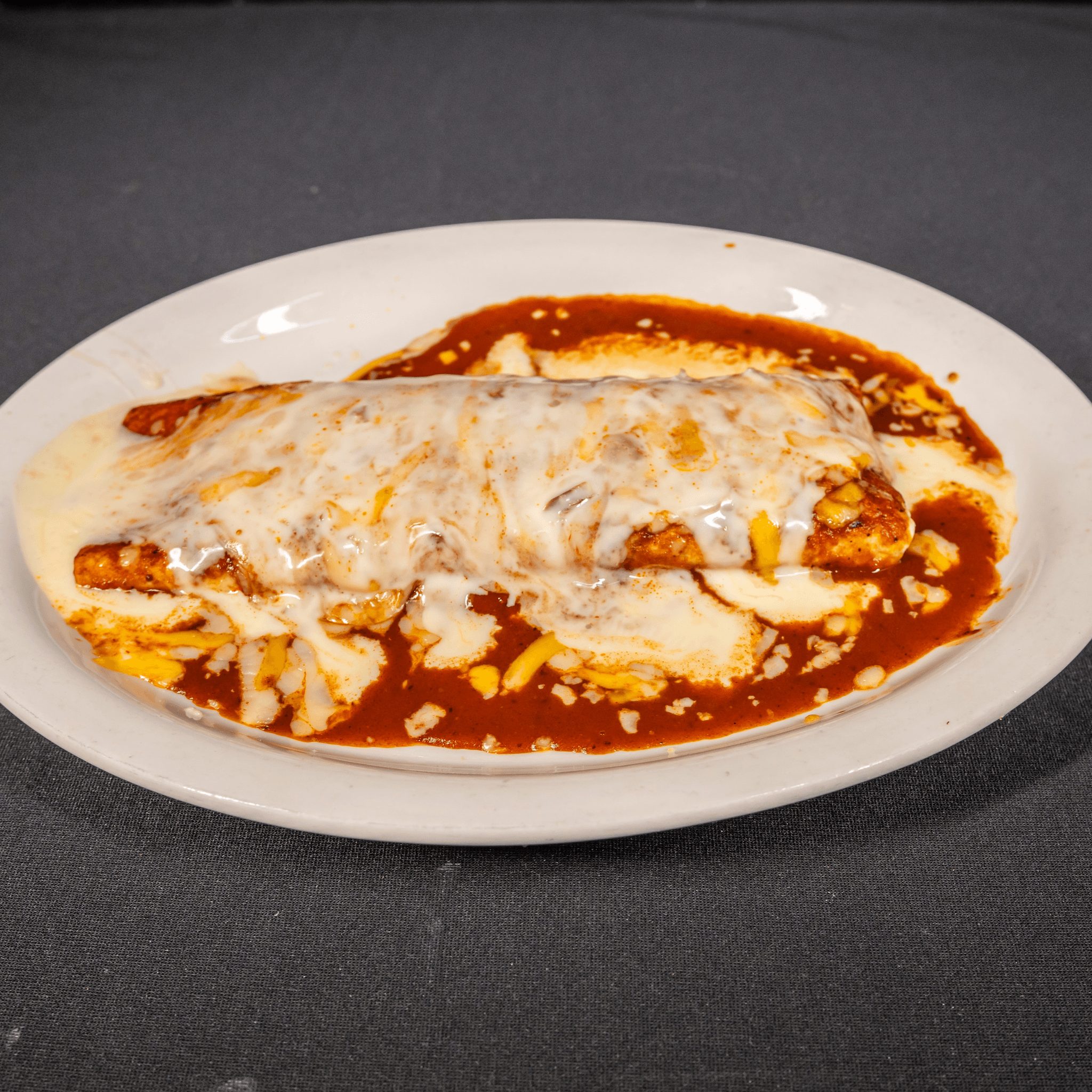 (16) Enchilada Burrito.