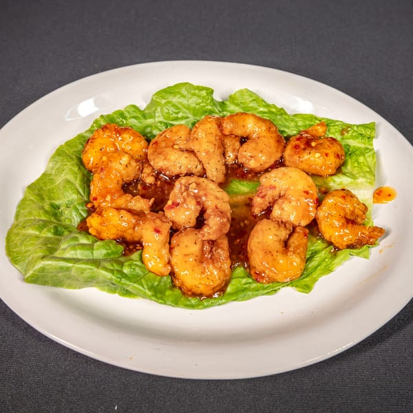 El Paso Mexican Grill's spicy shrimp appetizer, served on a bed of fresh green lettuce.
